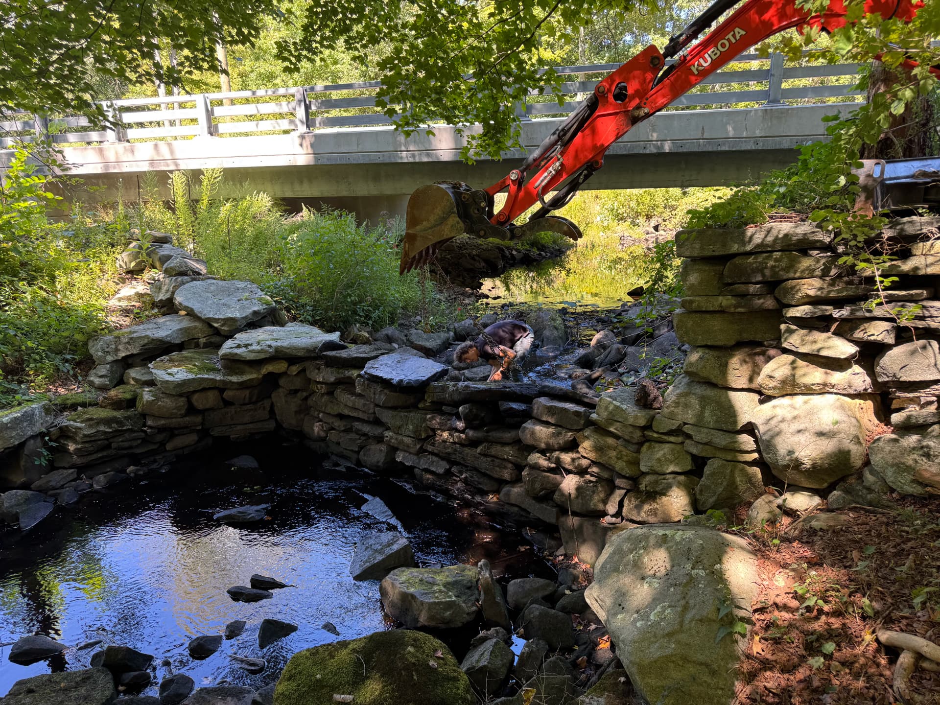 Gallery photos for Stone Dam and Wall Repair That Holds Up to Water Damage: Image #1