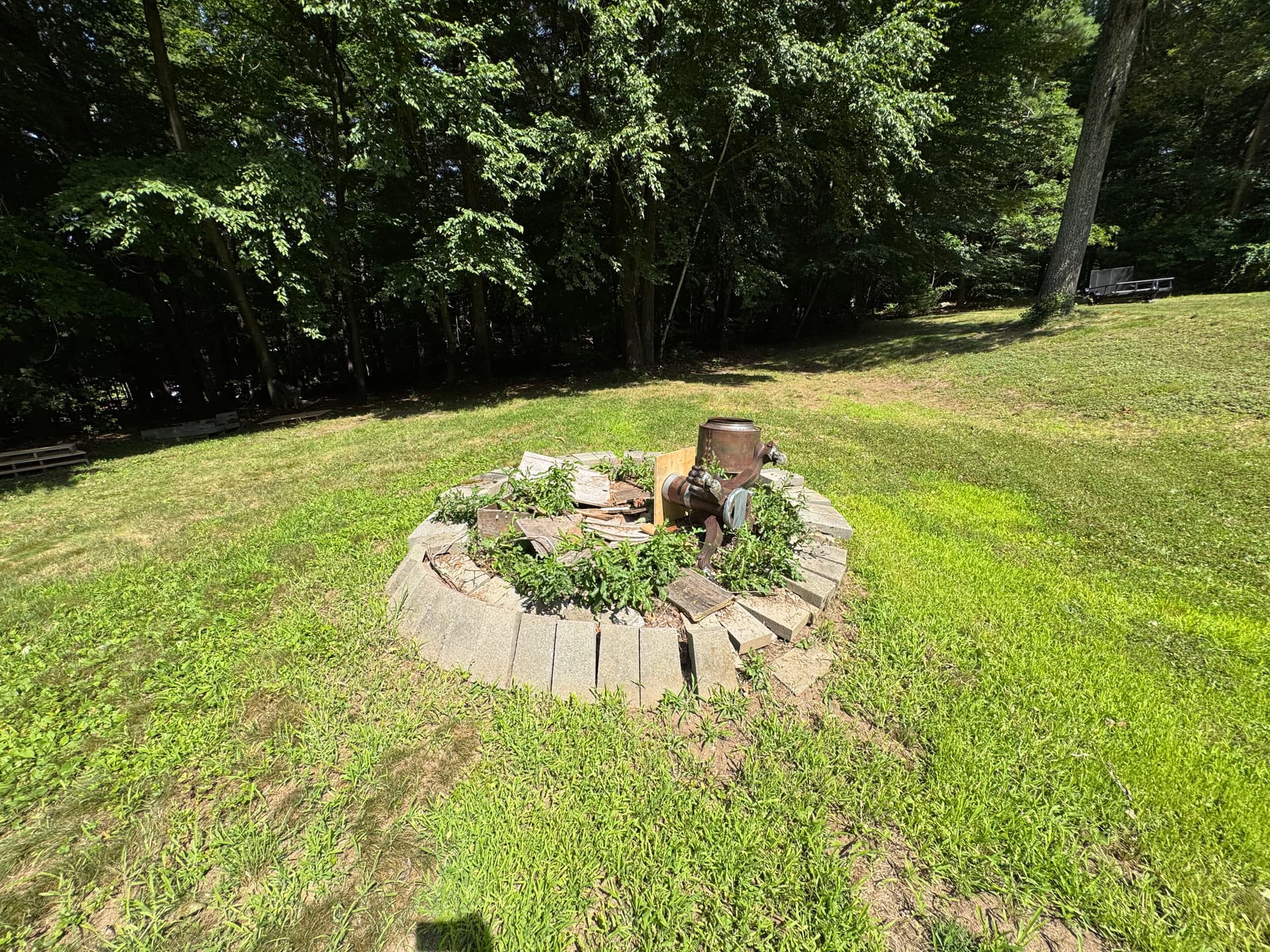 Gallery photos for Retaining Wall and Fire Pit Demo to Prep for Foundation Work: Image #1